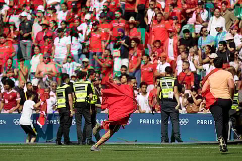 Pitch invaders during Argentina vs Morocco match